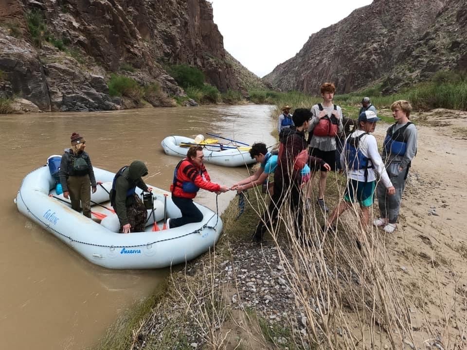 Students rafting on a river canyon trip